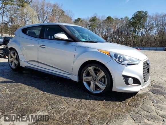 ✅ 2014 Hyundai Veloster Turbo • VIN: KMHTC6AE8EU183757 • Lot: 47384425. Wystawiony na Copart z przebiegiem 82 561 mil. Bezpłatny archiwum sprzedaży aukcyjnych z USA i szczegółowy raport historii pojazdu na DreamBid. Zdjęcie 4.