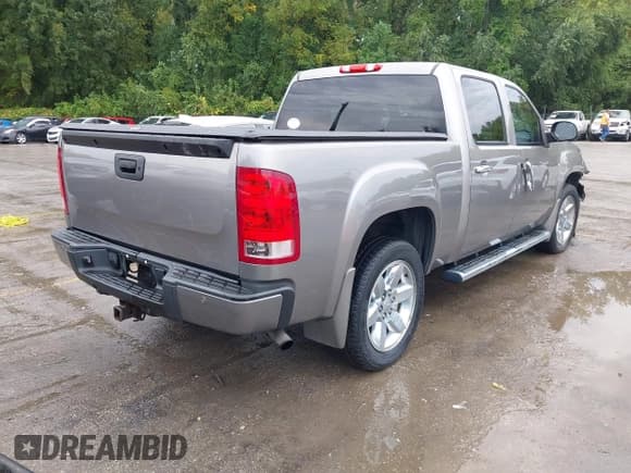 ✅ 2013 GMC Sierra 1500 SLT • VIN: 3GTP2WE72DG194940 • Lot: 43170172. Listed on IAAI with 190,690 mi. Free auction sales archive from the USA and detailed vehicle history report at DreamBid. Image 4.