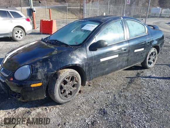 2005 Dodge Neon SXT with VIN 1B3ES56C85D196379, listed as a IAAI auction lot 41612965 with 158,304 mi miles and . Bid and sale history available at DreamBid. Image 2.