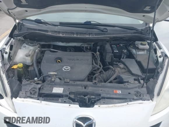 ✅ 2013 Mazda 5 Touring • VIN: JM1CW2CL7D0149735 • Lot: 41958617. Listed on IAAI with 120,488 mi. Free auction sales archive from the USA and detailed vehicle history report at DreamBid. Image 10.