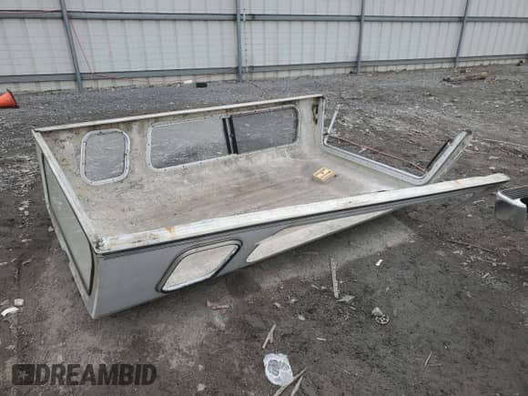 1987 Dodge Dakota z VIN 1B7GN14M2HS368408, wystawiony jako Copart lot #46088905 z przebiegiem 116 497 mil mil oraz Szkoda całkowita • Salvage title. Historia ofert i sprzedaży dostępna na DreamBid. Obrazek 14.