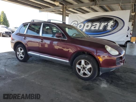 ✅ 2004 Porsche Cayenne • VIN: WP1AA29P74LA24053 • Лот: 69497125. Опубликован ранее на Copart с пробегом 248 021 миль. Бесплатный доступ к архиву аукционных продаж из США и подробный отчёт об истории автомобиля на DreamBid. Изображение 4.