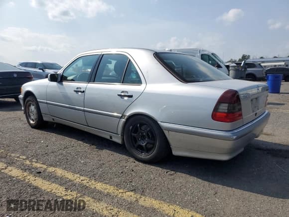 ✅ 2000 Mercedes-Benz C 230/260/280/320 • VIN: WDBHA29G3YA844405 • Lot: 66318365. Listed on Copart with 130,040 mi. Free auction sales archive from the USA and detailed vehicle history report at DreamBid. Image 2.