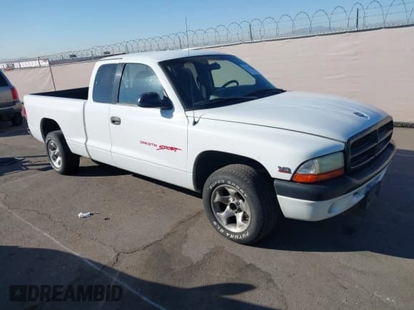 ✅ 1997 Dodge Dakota • VIN: 1B7GL23Y6VS207961 • Lot: 43703708. Wystawiony na IAAI z przebiegiem 297 431 mil. Bezpłatny archiwum sprzedaży aukcyjnych z USA i szczegółowy raport historii pojazdu na DreamBid. Zdjęcie 1.