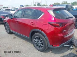 ✅ 2018 Mazda CX-5 Grand Touring • VIN: JM3KFADM0J1391986 • Lot: 43229848. Listed on IAAI with 87,989 mi. Free auction sales archive from the USA and detailed vehicle history report at DreamBid. Image 3.