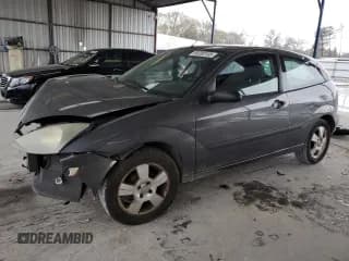 ✅ 2003 Ford Focus ZX3 • VIN: 3FAFP31Z73R178518 • Lot: 50200105. Listed on Copart with 317,147 mi. Free auction sales archive from the USA and detailed vehicle history report at DreamBid. Image 1.
