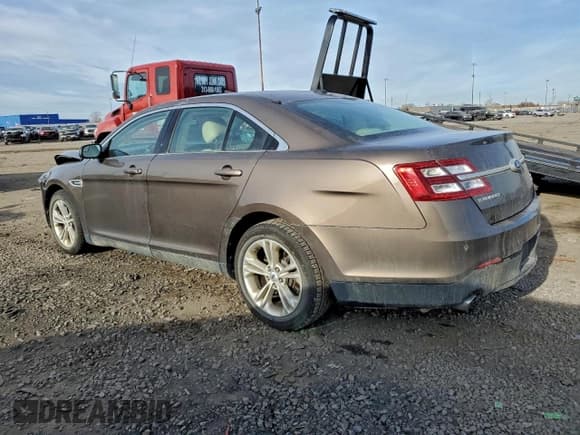 ✅ 2015 Ford Taurus SEL • VIN: 1FAHP2E93FG103386 • Лот: 93453175. Опубликован ранее на Copart с пробегом 121 177 миль. Бесплатный доступ к архиву аукционных продаж из США и подробный отчёт об истории автомобиля на DreamBid. Изображение 2.