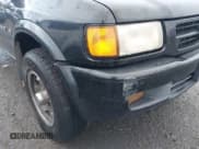 ✅ 1999 Honda Passport LX • VIN: 4S6CM58W2X4404849 • Lot: 43803941. Wystawiony na IAAI z przebiegiem 188 202 mil. Bezpłatny archiwum sprzedaży aukcyjnych z USA i szczegółowy raport historii pojazdu na DreamBid. Zdjęcie 6.