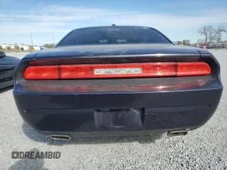 ✅ 2012 Dodge Challenger SXT • VIN: 2C3CDYAGXCH176697 • Lot: 87691325. Wystawiony na Copart z przebiegiem Nie podano. Bezpłatny archiwum sprzedaży aukcyjnych z USA i szczegółowy raport historii pojazdu na DreamBid. Zdjęcie 6.