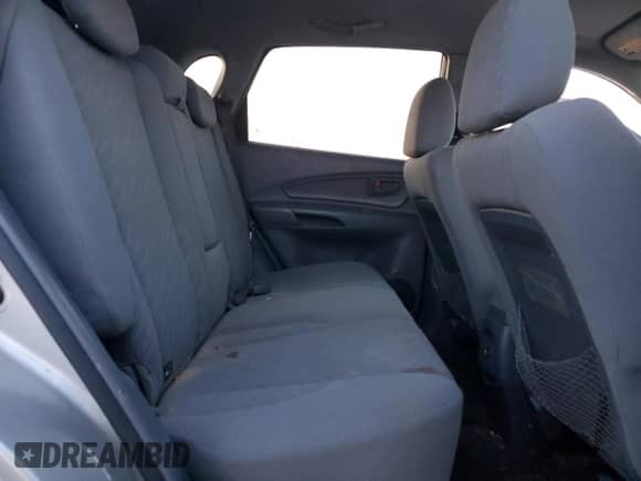 2005 Hyundai Tucson GL z VIN KM8JM12B65U078288, wystawiony jako Copart lot #85328574 z przebiegiem 91 117 mil mil oraz Czysty tytuł • Clean title. Historia ofert i sprzedaży dostępna na DreamBid. Obrazek 11.