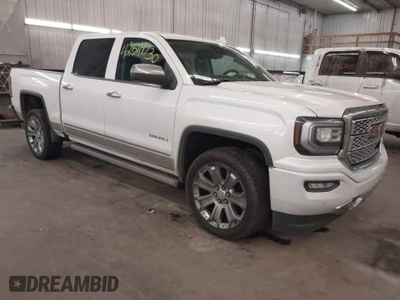 ✅ 2017 GMC Sierra 1500 Denali • VIN: 3GTU2PEJXHG240654 • Lot: 42549730. Listed on IAAI with 157,480 mi. Free auction sales archive from the USA and detailed vehicle history report at DreamBid. Image 1.