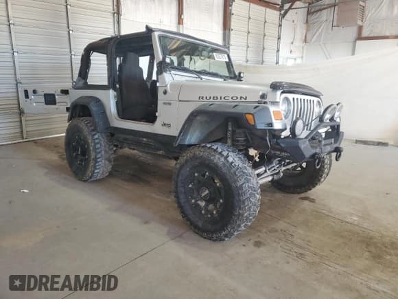 ✅ 2004 Jeep Wrangler Rubicon • VIN: 1J4FA69S14P758371 • Lot: 85557875. Wystawiony na Copart z przebiegiem 144 656 mil. Bezpłatny archiwum sprzedaży aukcyjnych z USA i szczegółowy raport historii pojazdu na DreamBid. Zdjęcie 4.