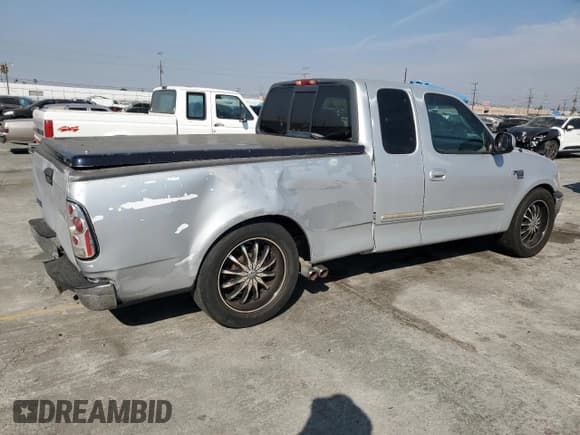 ✅ 2001 Ford F-150 XL • VIN: 1FTRX17L41KF48422 • Lot: 67605465. Listed on Copart with Not provided. Free auction sales archive from the USA and detailed vehicle history report at DreamBid. Image 3.
