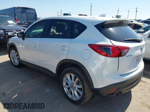 ✅ 2015 Mazda CX-5 Grand Touring • VIN: JM3KE2DY3F0487068 • Lot: 42702113. Wystawiony na IAAI z przebiegiem 110 989 mil. Bezpłatny archiwum sprzedaży aukcyjnych z USA i szczegółowy raport historii pojazdu na DreamBid. Zdjęcie 3.