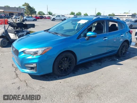 ✅ 2018 Subaru Impreza Limited • VIN: 4S3GTAT64J3738699 • Lot: 42723506. Listed on IAAI with 183,088 mi. Free auction sales archive from the USA and detailed vehicle history report at DreamBid. Image 2.