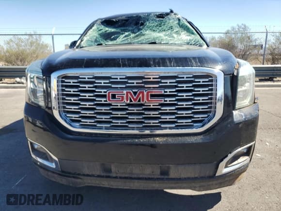 ✅ 2020 GMC Yukon Denali • VIN: 1GKS1CKJ9LR108974 • Lot: 72094315. Listed on Copart with 77,453 mi. Free auction sales archive from the USA and detailed vehicle history report at DreamBid. Image 5.