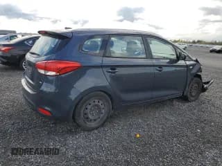 ✅ 2014 Kia Rondo LX • VIN: KNAHT8A33E7059590 • Lot: 73106324. Wystawiony na Copart z przebiegiem 168 217 mil. Bezpłatny archiwum sprzedaży aukcyjnych z USA i szczegółowy raport historii pojazdu na DreamBid. Zdjęcie 3.