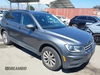 ✅ 2020 Volkswagen Tiguan S • VIN: 3VV1B7AXXLM033223 • Lot: 42906678. Listed on IAAI with 36,927 mi. Free auction sales archive from the USA and detailed vehicle history report at DreamBid. Image 1.