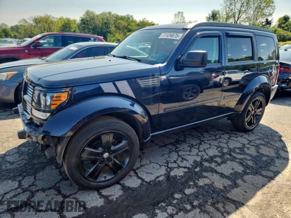 2011 Dodge Nitro Shock with VIN 1D4PT7GX1BW576300, listed as a Copart auction lot 71124675 with 86,382 mi miles and Salvage title. Bid and sale history available at DreamBid. Image 1.