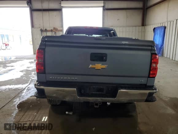 2015 Chevrolet Silverado 1500 LT z VIN 1GCVKRECXFZ429352, wystawiony jako Copart lot #59278335 z przebiegiem 69 532 mil mil oraz Szkoda całkowita • Salvage title. Historia ofert i sprzedaży dostępna na DreamBid. Obrazek 6.