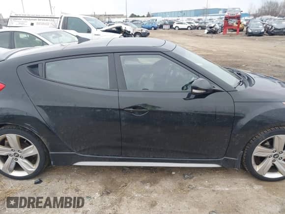 2013 Hyundai Veloster Turbo с VIN KMHTC6AE9DU159675, выставлен на аукционе IAAI как лот 41894186 с пробегом 134 382 миль миль и . История ставок и продаж доступна на DreamBid. Изображение 13.
