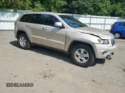 ✅ 2014 Jeep Grand Cherokee Laredo • VIN: 1C4RJEAG8EC243283 • Лот: 68132675. Опубликован ранее на Copart с пробегом 130 652 миль. Бесплатный доступ к архиву аукционных продаж из США и подробный отчёт об истории автомобиля на DreamBid. Изображение 4.