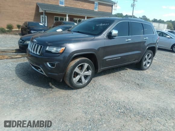 ✅ 2014 Jeep Grand Cherokee Overland • VIN: 1C4RJFCG6EC570431 • Lot: 41935177. Listed on IAAI with 182,905 mi. Free auction sales archive from the USA and detailed vehicle history report at DreamBid. Image 2.
