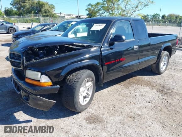 1999 Dodge Dakota Sport with VIN 1B7GL22Z1XS281298, listed as a IAAI auction lot 43418465 with 164,344 mi miles and . Bid and sale history available at DreamBid. Image 2.