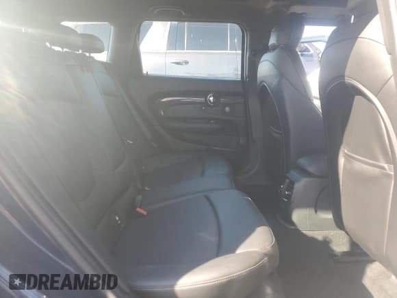 ✅ 2018 MINI Clubman Cooper S • VIN: WMWLN9C51J2E50594 • Lot: 87117155. Wystawiony na Copart z przebiegiem 100 123 mil. Bezpłatny archiwum sprzedaży aukcyjnych z USA i szczegółowy raport historii pojazdu na DreamBid. Zdjęcie 10.