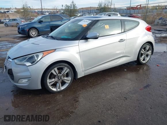 ✅ 2012 Hyundai Veloster w/Gray Int • VIN: KMHTC6AD7CU033319 • Lot: 43815911. Listed on IAAI with Not provided. Free auction sales archive from the USA and detailed vehicle history report at DreamBid. Image 2.