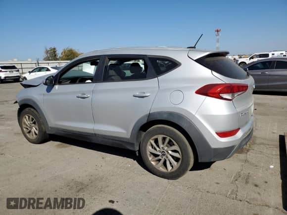 2016 Hyundai Tucson SE with VIN KM8J33A4XGU105738, listed as a Copart auction lot 85884105 with 111,458 mi miles and Salvage title. Bid and sale history available at DreamBid. Image 2.