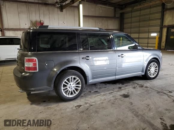 ✅ 2016 Ford Flex SEL • VIN: 2FMGK5C89GBA12319 • Лот: 82546045. Опубликован ранее на Copart с пробегом 96 726 миль. Бесплатный доступ к архиву аукционных продаж из США и подробный отчёт об истории автомобиля на DreamBid. Изображение 3.