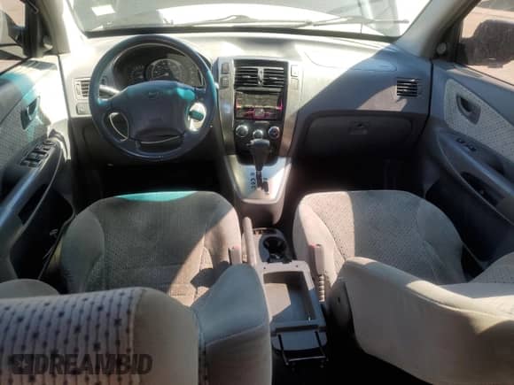 2005 Hyundai Tucson GLS z VIN KM8JN12D25U093398, wystawiony jako Copart lot #75510154 z przebiegiem 195 678 mil mil oraz Szkoda całkowita • Salvage title. Historia ofert i sprzedaży dostępna na DreamBid. Obrazek 8.