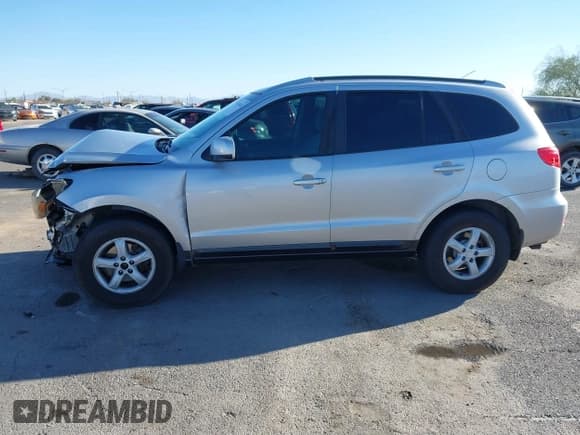 ✅ 2007 Hyundai Santa Fe GL 5Pass • VIN: 5NMSG13E97H011140 • Lot: 41674436. Listed on IAAI with 347,823 mi. Free auction sales archive from the USA and detailed vehicle history report at DreamBid. Image 15.