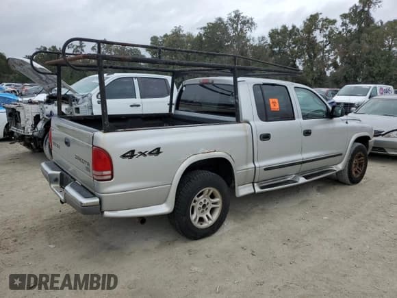 ✅ 2004 Dodge Dakota SLT • VIN: 1D7HG48N64S535761 • Lot: 84379954. Wystawiony na Copart z przebiegiem 196 104 mil. Bezpłatny archiwum sprzedaży aukcyjnych z USA i szczegółowy raport historii pojazdu na DreamBid. Zdjęcie 3.
