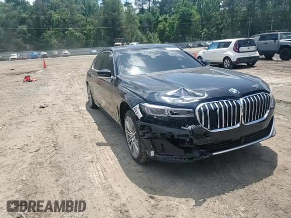 ✅ 2022 BMW 7 Series 740i • VIN: WBA7T2C06NCJ48203 • Лот: 54183325. Опубликован ранее на Copart с пробегом Не указан. Бесплатный доступ к архиву аукционных продаж из США и подробный отчёт об истории автомобиля на DreamBid. Изображение 13.