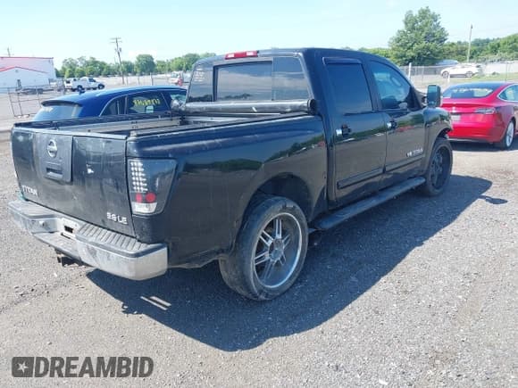✅ 2005 Nissan Titan LE • VIN: 1N6AA07B05N509859 • Lot: 42662424. Listed on IAAI with 252,000 mi. Free auction sales archive from the USA and detailed vehicle history report at DreamBid. Image 4.