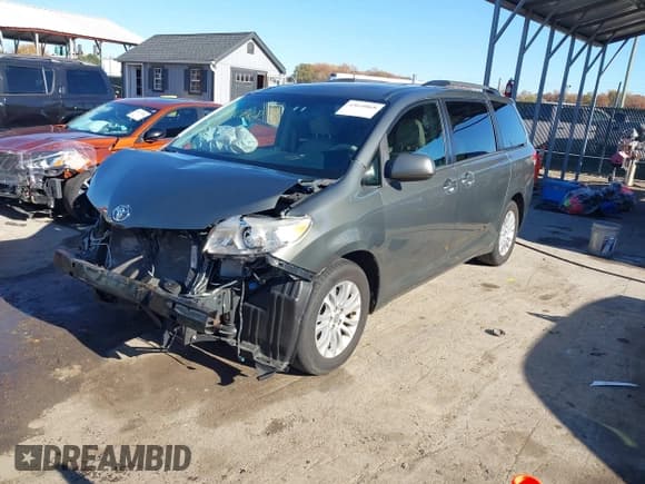 ✅ 2012 Toyota Sienna XLE AAS • VIN: 5TDYK3DC7CS277507 • Lot: 43610868. Listed on IAAI with 118,590 mi. Free auction sales archive from the USA and detailed vehicle history report at DreamBid. Image 2.