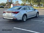✅ 2020 Toyota Avalon Hybrid XLE • VIN: 4T1A21FBXLU016423 • Лот: 88176295. Опубликован ранее на Copart с пробегом 25 476 миль. Бесплатный доступ к архиву аукционных продаж из США и подробный отчёт об истории автомобиля на DreamBid. Изображение 4.