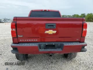 ✅ 2018 Chevrolet Silverado 1500 LT • VIN: 3GCUKREC4JG179403 • Лот: 70026954. Опубликован ранее на Copart с пробегом 96 670 миль. Бесплатный доступ к архиву аукционных продаж из США и подробный отчёт об истории автомобиля на DreamBid. Изображение 6.