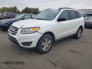 ✅ 2012 Hyundai Santa Fe GLS • VIN: 5XYZGDAGXCG116939 • Lot: 75958794. Listed on Copart with 262,257 mi. Free auction sales archive from the USA and detailed vehicle history report at DreamBid. Image 1.