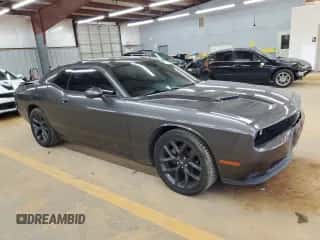 2020 Dodge Challenger SXT с VIN 2C3CDZAG1LH110030, выставлен на аукционе Copart как лот 86490005 с пробегом 74 580 миль миль и Списание • Salvage title. История ставок и продаж доступна на DreamBid. Изображение 4.