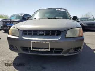 2001 Hyundai Accent GL with VIN KMHCG45C91U186811, listed as a Copart auction lot 56210515 with 79,730 mi miles and Salvage title. Bid and sale history available at DreamBid. Image 5.