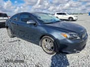 ✅ 2007 Scion tC • VIN: JTKDE167070212025 • Lot: 94444555. Listed on Copart with 248,006 mi. Free auction sales archive from the USA and detailed vehicle history report at DreamBid. Image 4.