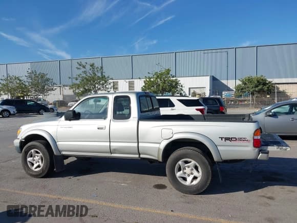✅ 2002 Toyota Tacoma PreRunner • VIN: 5TESN92N22Z036458 • Lot: 43032856. Listed on IAAI with 127,929 mi. Free auction sales archive from the USA and detailed vehicle history report at DreamBid. Image 15.