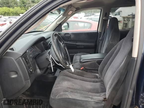 2002 Dodge Dakota SLT z VIN 1B7HG48N42S711374, wystawiony jako Copart lot #68991894 z przebiegiem Nie podano mil oraz Czysty tytuł • Clean title. Historia ofert i sprzedaży dostępna na DreamBid. Obrazek 7.