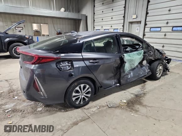 ✅ 2021 Toyota Prius XLE • VIN: JTDKAMFP8M3182178 • Lot: 93390195. Listed on Copart with Not provided. Free auction sales archive from the USA and detailed vehicle history report at DreamBid. Image 3.