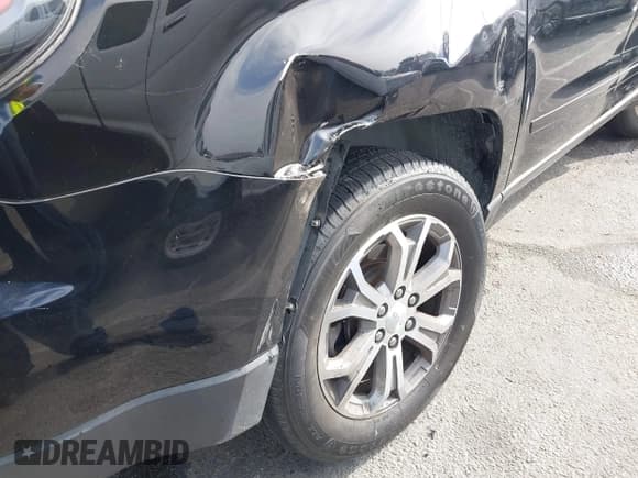 ✅ 2016 GMC Acadia SLT • VIN: 1GKKRRKD2GJ217206 • Lot: 43226180. Listed on IAAI with 118,543 mi. Free auction sales archive from the USA and detailed vehicle history report at DreamBid. Image 17.