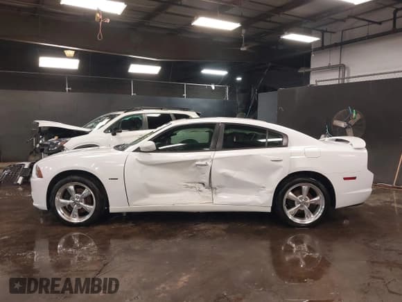 ✅ 2013 Dodge Charger RT Plus • VIN: 2C3CDXDT4DH537913 • Lot: 41583876. Listed on IAAI with 90,648 mi. Free auction sales archive from the USA and detailed vehicle history report at DreamBid. Image 14.