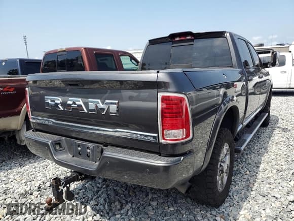 ✅ 2018 Ram 2500 Limited • VIN: 3C6UR5GL1JG368664 • Lot: 55570555. Listed on Copart with 127,134 mi. Free auction sales archive from the USA and detailed vehicle history report at DreamBid. Image 4.